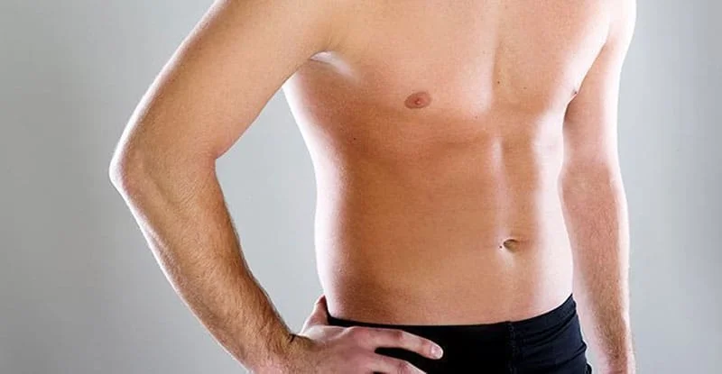 What causes puffy nipples in men?